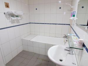 Koupelna v ubytování Yi Pin Yuan Hotel