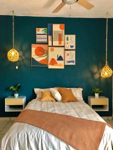 Кровать или кровати в номере “Casa Raíz” habitaciones Boho