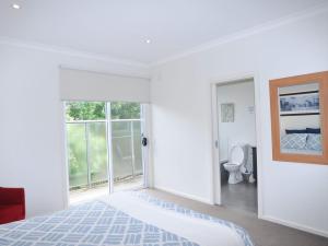 Ein Bett oder Betten in einem Zimmer der Unterkunft Sandpiper 3 - Close to Town and Beach