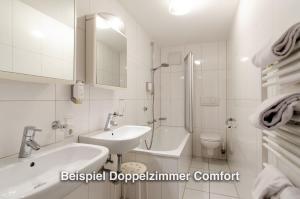 Koupelna v ubytování Kurgarten-Hotel