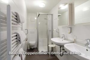 Koupelna v ubytování Kurgarten-Hotel