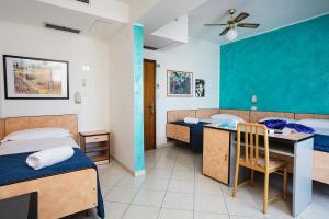 Postel nebo postele na pokoji v ubytování Hotel Albatros