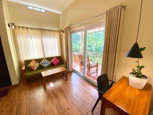 Flower Valley Plantation Homestay的休息区