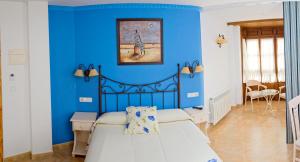 Postel nebo postele na pokoji v ubytování Hotel Rural La Corte de los Pinares