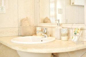 Kúpeľňa v ubytovaní Konomi Residence + 18 fotografií