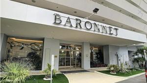 a store front of a barrington with a sign on it at 4 pers , 100m de la plage marina baie des anges French Riviera in Villeneuve-Loubet