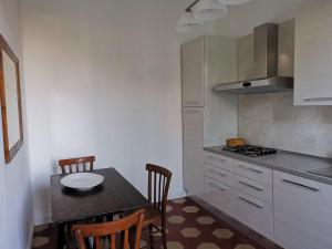A kitchen or kitchenette at CASA PAVONI