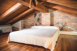 Posteľ alebo postele v izbe v ubytovaní Il Giardino sul Tetto B&B