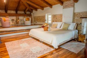 Posteľ alebo postele v izbe v ubytovaní Il Giardino sul Tetto B&B