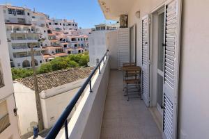 a balcony with a view of buildings at Le Modern' in Albufeira