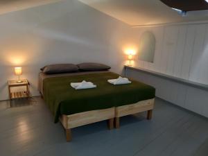 Postel nebo postele na pokoji v ubytování B&B La Forcella
