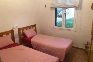 Ένα ή περισσότερα κρεβάτια σε δωμάτιο στο Apartamento con preciosa vista al mar y AA