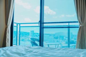 Uma cama ou camas num quarto em Baby Dolphin
