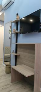 TV a/nebo společenská místnost v ubytování Mini Hotel Wf2 Caltagirone