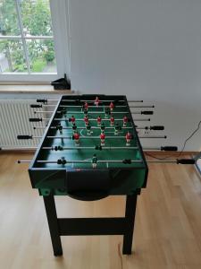 a snooker table in a room with afits at Tolles seenahes Apartment am Bodensee mit großer Terrasse in Sipplingen