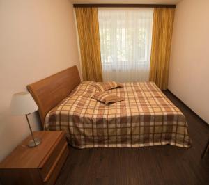 Voodi või voodid majutusasutuse Tsaghkahovit Hotel toas