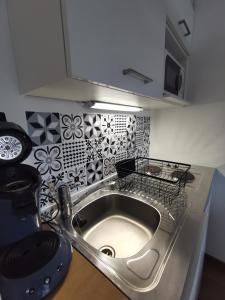 Een keuken of kitchenette bij Le Cocon - Vue panoramique Strasbourg - Wifi - Netflix