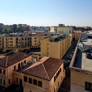 une vue aérienne sur une ville avec des bâtiments dans l'établissement Lux, à Padoue