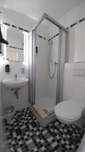 Koupelna v ubytování Hotel Xantener Eck
