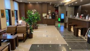 Lobby o reception area sa Hotel Route-Inn Iyo-Saijo