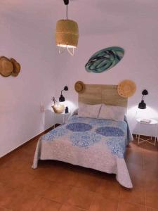 Posteľ alebo postele v izbe v ubytovaní Dos Casas juntas y Patio común a 25 metros de la Playa