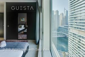 Postel nebo postele na pokoji v ubytování Al Majara by EMAAR, Dubai Marina