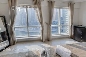 TV a/nebo společenská místnost v ubytování Al Majara by EMAAR, Dubai Marina