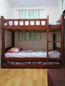 Postel nebo postele na pokoji v ubytování Eurie's Furnished Unit