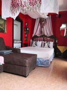מיטה או מיטות בחדר ב-Casa Ronda 1808