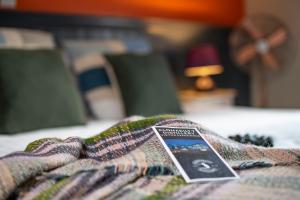 Letto o letti in una camera di Emmet Hotel
