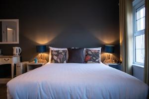 Letto o letti in una camera di Emmet Hotel