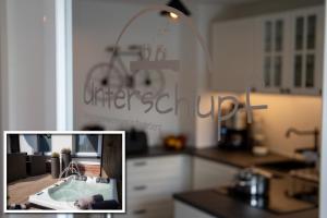Kuchyň nebo kuchyňský kout v ubytování Unterschlupf Radeberg mit Garten & Whirlpool