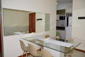 Køkken eller tekøkken på Apartamento a beira mar completo com churrasqueira