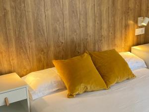 Postel nebo postele na pokoji v ubytování LOS RESPIGOS PLAYA