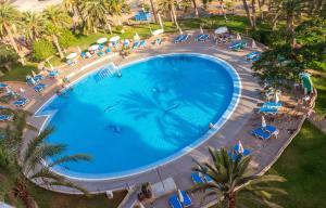 Bazén v ubytování Résidence Pierre & Vacances Marazul del Sur nebo v jeho okolí