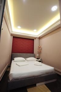 Voodi või voodid majutusasutuse GOLDEN SECONDS Hotel toas