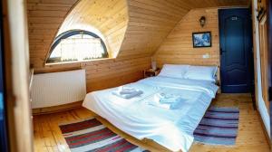 Postel nebo postele na pokoji v ubytování Casa Buga