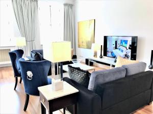 Μια τηλεόραση ή/και κέντρο ψυχαγωγίας στο Luxury Suites & Apartments MONDRIAN Market Square II +24 φωτογραφίες