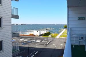 a view of the ocean from the balcony of a building at Thunder Island 75B condo in Ocean City