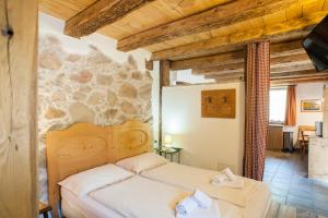 Postel nebo postele na pokoji v ubytování Maso Franceschella + 37 fotografií