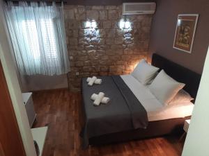 Postel nebo postele na pokoji v ubytování Carol Rooms