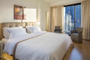 Postel nebo postele na pokoji v ubytování O Monot Boutique Hotel Beirut + 37 fotografií