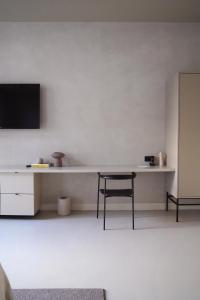 TV a/nebo společenská místnost v ubytování Hotel âme
