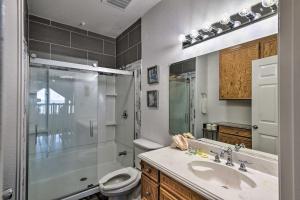 a bathroom with a sink and a shower and a toilet at Bayfront Fishing Pier Galveston Island Home! in Galveston +30 photos