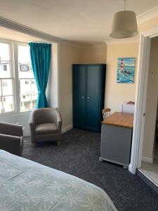 Кровать или кровати в номере Letchworth Guest House