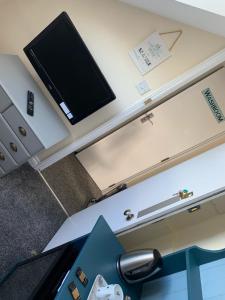 A television and/or entertainment center at Letchworth Guest House 