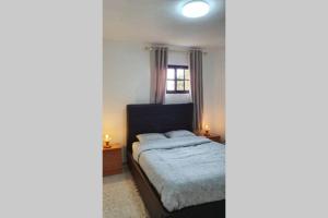 Posteľ alebo postele v izbe v ubytovaní Lovely two bedroom apartment with amazing view
