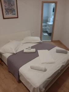 Posteľ alebo postele v izbe v ubytovaní Penthaus Apartment N&M