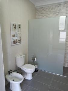 Ванная комната в Alojamento Fernandes
