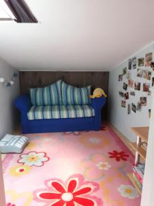 Łóżko lub łóżka w pokoju w obiekcie Ferienwohnung Orchidee